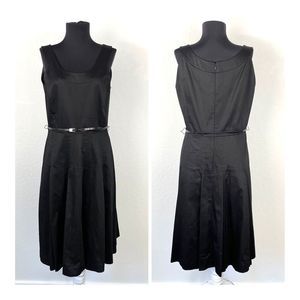 Elegant Black Sleeveless Dress with Round Neck and Full Circle Skirt